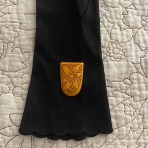 Vintage carved Bakelite dress clip